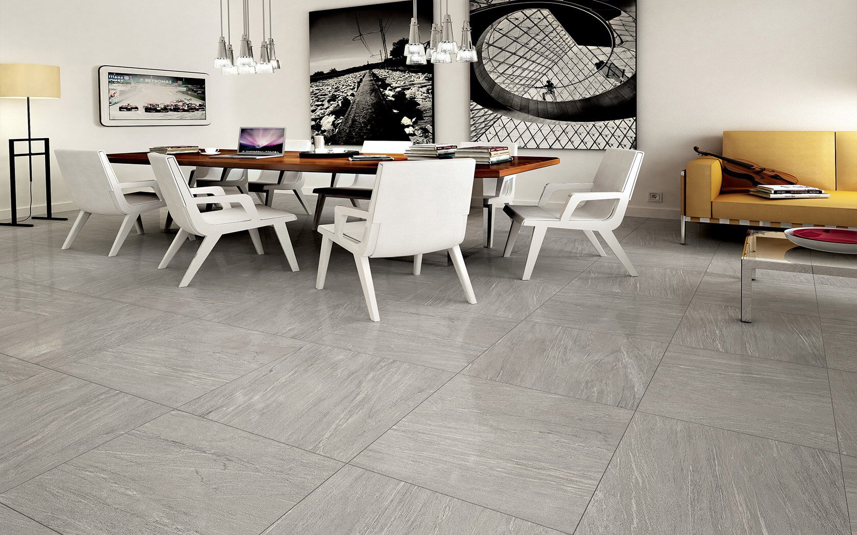 Alfalux Valmalenco põrandaplaadid hallis elutoas, mille sisekujundus on modernne ja skandinaavialik