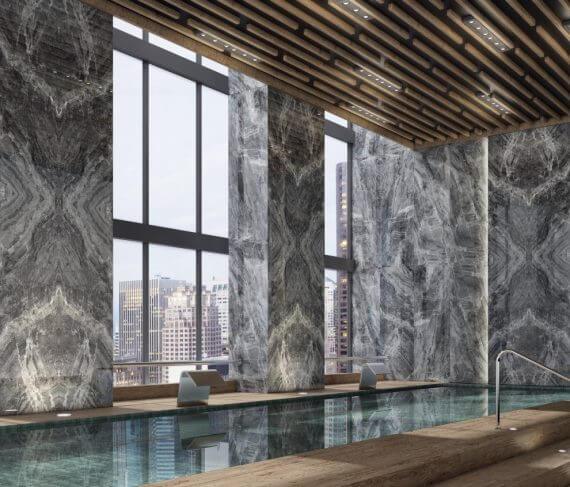 Coverlam Brunno – hallid tekstuurplaadid luksusliku spaalaadse basseini ümbruses