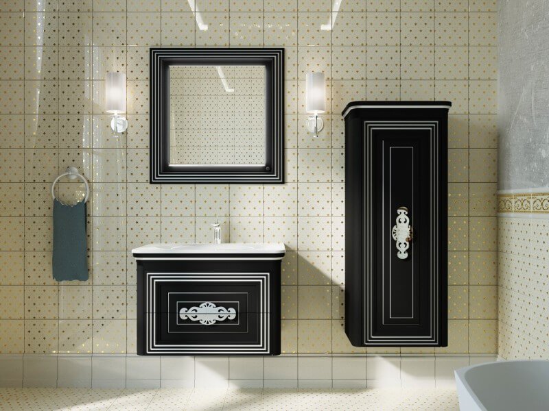 Must vannitoam&ouml;&ouml;bel klassikaliste ornamentidega heledal taustal. Seinapealne kapp ja valamukapp loovad luksusliku ja ajatu mulje.