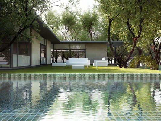 Modernne maja aia ja basseini &auml;&auml;res, valged diivanid roheluse taustal.